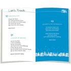 "Herzenslicht, Lichter im Advent" links. "Adventliche Sehnsucht" rechts, mit winterlicher Häuserzeile unten.