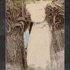 „GESUNDHEIT“ steht am unteren Rand. Eine historische Illustration zeigt eine Person in weißer Kleidung mit Weizenähren.