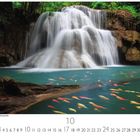 Text: Thailand, Huai Mae Khamin Wasserfall, Zahlen von 1 bis 31.  
Wasserfall und bunte Fische in einem klaren Teich.