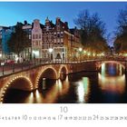 "Abend in der Altstadt" steht oben. Unten ist eine Kanalbrücke mit Lichtern und Gebäuden bei Dämmerung zu sehen.