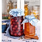 Text: "Weichseln im Vanille-Zitronen-Sud und Gelbe Kirschen mit Honig und Zimt (Rezepte S. 84)". Zwei Einmachgläser mit Früchten.