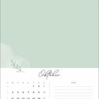 Oktober-Kalender mit Notizfeld, Wochenbeginn bei Montag. Dezente Blattform oberhalb der Daten. Pastellgrüner Hintergrund.