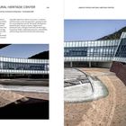 UNESCO WORLD NATURAL HERITAGE CENTER. Architektur mit modernen Glasstrukturen und geschwungenen Formen, umgeben von Natur.