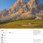 Juli, 29. Woche; Krebs: 21.6–22.7, Löwe: 23.7–22.8. Berge im Sonnenlicht, grünes Tal, kleiner Berggasthof. Kalender mit Wochenplan.