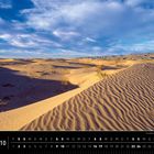 Text: "Mexiko 10", "Sanddünen in der Chihuahuan Desert". 

Goldene Sanddünen, verschlungene Muster, blauer Himmel, weite Landschaft.