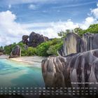 Anse Source d'Argent - Seychellen, 11. Auf einem Kalenderblatt: Strandszenerie mit Palmen und markanten Felsen.