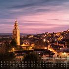 „St Anne’s Church Shandon Bells & Tower, Cork“; Kalenderansicht; beleuchtete Stadtlandschaft bei Sonnenuntergang.