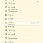 Kalender für November mit besonderen Tagen, Blätterzweige und ein Specht-Illustration in herbstlichen Farben.
