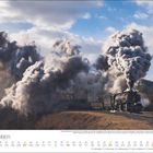 November-Kalender mit einem Dampflok-Foto, Datumstage unten. Lokomotive dampft auf Schienen durch eine ländliche Gegend.