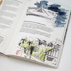 "Vollkommenheit in der Unvollkommenheit" und "Grundiert mit Teebeutel". Buchseite mit Illustrationen von Pflanzen und Gebäuden.