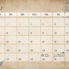 Kalender für Juli. Zeichnung eines Einhorns und eines Besens, Kuchensymbol an Neville Longbottoms Geburtstag.