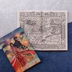 Ein Buch mit dem Titel "Never Ever After" von Sue Lynn Tan liegt neben einer detaillierten Karte "The Three Kingdoms".