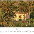 „Finca im Morgenlicht“, „CASARES EDITION“, „12“. Eine gelbe Villa umgeben von Palmen und üppiger Vegetation.