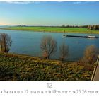 Niederrhein, Kalender, Dezember, Landschaft mit Fluss, Bäumen, Schiff und Brücke.