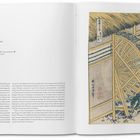 Titel: "Water-wheel at Onden (Onden no suisha)" mit Texten in mehreren Sprachen. Illustration eines Wasserrades und Landschaft.