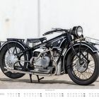 "R52", "1929". Kalender unten: "DEZEMBER", Tage und Daten. Altes Motorrad mit BMW-Logo im Profil auf grauem Boden.