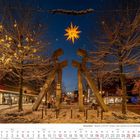 Remscheid - Skulptur „Licht-Tor“ (Zange, Lützer) bei Nacht, verschneite Szene mit beleuchteten Bäumen und Weihnachtsstern.