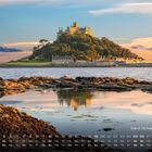 Text: "Stankt Michael's Mount" und eine Monatsübersicht für Dezember. Eine Burg auf einer Insel bei Sonnenuntergang im Hintergrund.