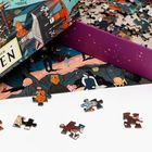 "Die Welt der Hexen" steht auf der Verpackung. Puzzleteile liegen vor einer teils gefüllten lila Schachtel.