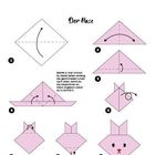 Origami-Anleitung für "Der Hase". Schritte 1-8: Falte ein quadratisches, rosa Papier, um einen Hasenkopf zu formen.