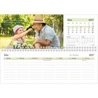 Text oben links: "Er segnet, die den Herrn fürchten, die Kleinen und die Großen. Psalm 115,13". 

Es ist ein Monatskalender für Mai 2027, mit Tagesübersicht und Fotos von einem Mädchen und einem Mann mit Strohhüten im Garten. Feiertage: Christi Himmelfahrt (6.) und Muttertag (9.).