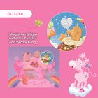 Text: "Glitzer", "Magischer Glitzer auf allen Puzzles und Verpackung." Illustration: Rosa Einhörner auf Wolken und Regenbögen.
