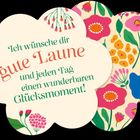 Text: "Ich wünsche dir gute Laune und jeden Tag einen wunderbaren Glücksmoment!" Blumenillustrationen verzieren den Hintergrund.