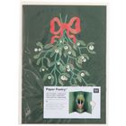 Text: Paper Poetry, Pop-up Karte, Umschlag. Illustration: Mistelzweig mit roter Schleife auf dunklem Hintergrund.