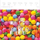 Kalendertext: Montag 29* März 2027 bis Sonntag 4, 13. Kalenderwoche. Spruch: Möge dein Tag so bunt sein wie ein Osternest! Bunte Süßigkeiten im Hintergrund.