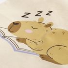 Die Illustration zeigt schlafendes Capybara mit "Zzz" über dem Kopf, das auf einem Buch liegt.