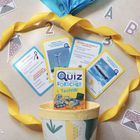"Das Quiz für kleine Forscher: Technik", farbige Karten, gelbes Band, nummerierte Buchstaben, Motiv von Windrädern und Flugzeug.