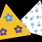 Gelbes Dreieck mit Blumenmuster, weißes Dreieck mit blauen Punkten, überlappen sich leicht.