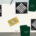 Text: "LIFE", "Player 1", "Player 2", "Player 3". Vier Karten, Spielblätter, Stifte.