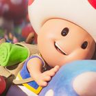 Ein fröhlicher animierter Charakter mit Pilzhelm umarmt einen großen Pilz in einer bunten Umgebung mit vielen weiteren Pilzen.