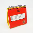 Ein Tischkalender mit rotem Deckblatt zeigt die Zahl 8. Darunter ein Franz Grillparzer Zitat über kalte Füße und Gedanken.