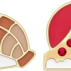 Links Sushi-Muster mit grünen Steinen, rechts Vulkan mit rotem Himmel und roten Steinen, goldumrandet.