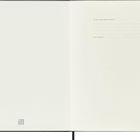 Text oben rechts: "In case of loss, please return to: ... As a reward: $ ...". Cremefarbenes leeres Notizbuch.