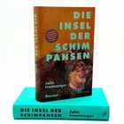 "Die Insel der Schimpansen" von John Ironmonger. Cover: Illustration mit Schimpanse. Buch liegt auf türkisem Untergrund.