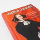 "Jutta Jacobi. Kristina von Schweden. Eine Biografie." zeigt ein historisches Porträt von Kristina vor rotem Hintergrund.