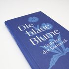 "Die blaue Blume. Gedichte der Romantik." Auf blauem Buchdeckel mit floraler Illustration. Reclam-Verlag.