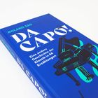 Text: "ROLAND ZAG DA CAPO! Eine andere Geschichte der Klassik in 66 Erzählungen." Auf dem Cover ist ein Flügel abgebildet.