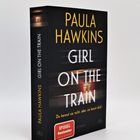 "PAULA HAWKINS GIRL ON THE TRAIN. Du kennst sie nicht, aber sie kennt dich! Spiegel Bestseller. Jetzt als Taschenbuch." 
Ein Buch.