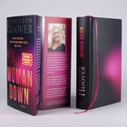 "WOMAN DOWN", Roman von Colleen Hoover; Text: "'Spiegel'-Bestseller-Autorin", mit rosa Lesezeichen, Autorenfoto innen.