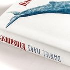 "Daniel Haes Eintausend" steht auf dem Buchrücken. Eine detaillierte Wal-Illustration schmückt das Cover.