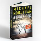 Titel: "Michael Robotham - Bruderherz". Untertitel: "Thriller". Sticker: "Spiegel Bestseller-Autor". Cover zeigt karge Bäume.