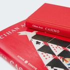 Zwei rote Bücher mit Text "Cihan Acar CASINO". Cover mit Kartenmotiven.