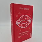 "Kiss me, Baby!" von Ulrike Zeitlinger. Rotes Buchcover mit Kussmund und kleinen Lippenabdrücken.