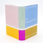 "Buchumschlag mit Texten: 'Leben der Bücher', 'Eine Bestandsaufnahme', 'Bibliothek Suhrkamp'. Pastellfarbige Flächen."
