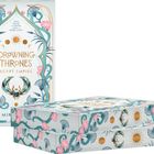 "Drowning Thrones: Egypt Empire" steht auf einem Buchcover mit floralen Mustern und einem stilisierten Skarabäus.