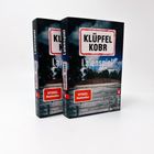 Zwei Bücher mit dem Titel "Kluftinger" und "Laienspiel" von Klüpfel Kobr. Auf dem Cover ist eine Bank abgebildet.